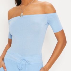 Blue off the shoulder shirt
